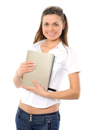   The young girl with long hair and the bookの写真素材