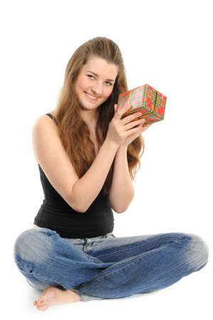  The happy woman with the gift, separately on a white backgroundの写真素材