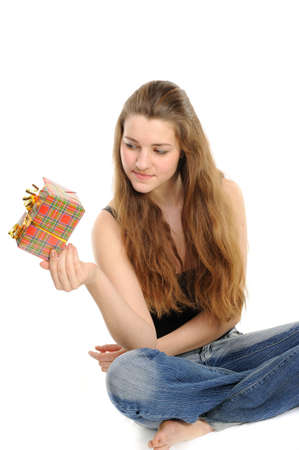  The happy woman with the gift, separately on a white backgroundの写真素材
