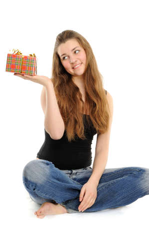  The happy woman with the gift, separately on a white backgroundの写真素材