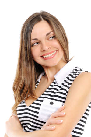 Positive young woman smiling over white backgroundの写真素材