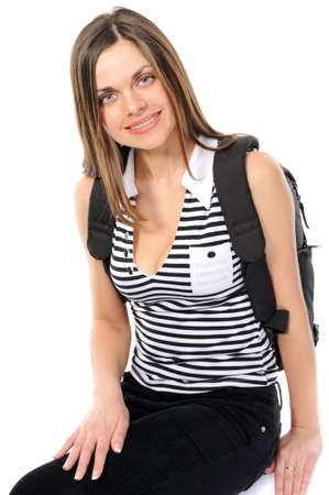  Pretty young female student with a backpack, smiles の写真素材