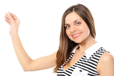 young woman, holds your product on a whate backgroundの写真素材