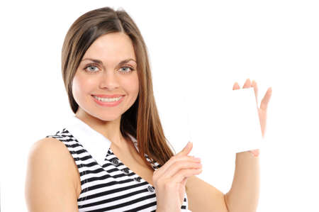 Beautiful girl holding empty white board on a white backgroundの写真素材