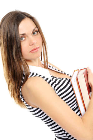 beautiful girl  holds the book on a white backgroundの写真素材