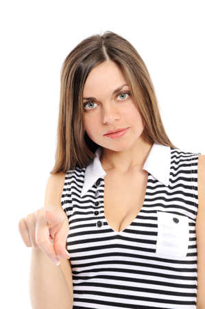 The young woman showing on something by a finger の写真素材