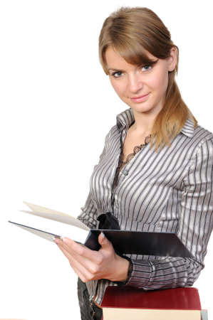Young girl with long hair and book on a white backgroundの写真素材