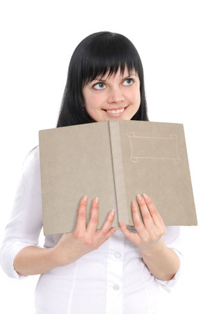  Dreaming woman with the book in hands, on a white backgroundの写真素材