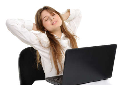 woman with a laptop rest - isolated over a white backgroundの写真素材