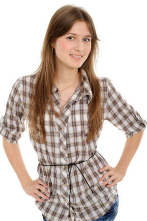 Portrait of a charming young female smiling against white backgroundの写真素材