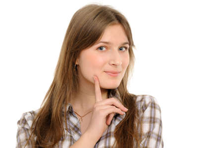 Portrait of a charming young female smiling against white backgroundの写真素材
