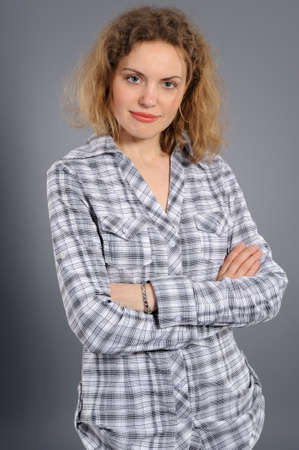 Portrait of the active woman, on a grey backgroundの写真素材