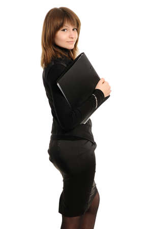 Beautiful confident woman with a folder on a white backgroundの写真素材