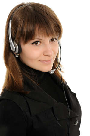 Young female customer service representative in headsetの写真素材