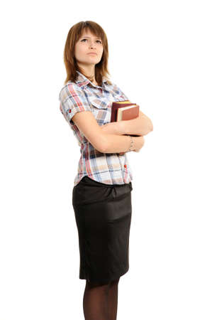 Young girl with  book rear view  against の写真素材