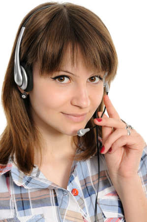 Young female customer service representative in headsetの写真素材