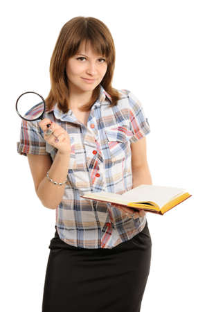 Eye and magnifying glass and book on a white backgroundの写真素材