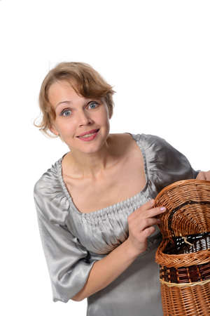 Portrait of a attractive woman holding a basketの写真素材