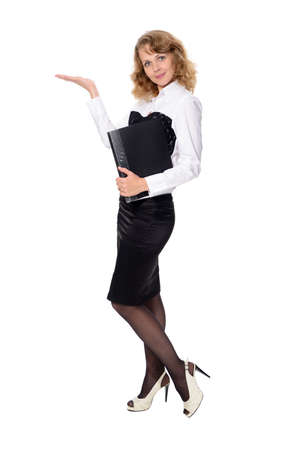 Beautiful business woman with a folder holding hand presenting a product  On a white background の写真素材