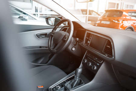 Interior of a new car in a dealershipの写真素材