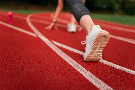 Runner feet in the stadium trackの写真素材