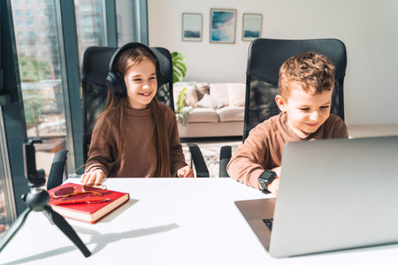 Boy and girl at laptop. Distance education