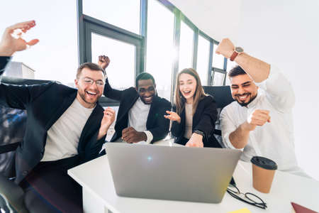 Group of multiracial business people celebrating successの写真素材