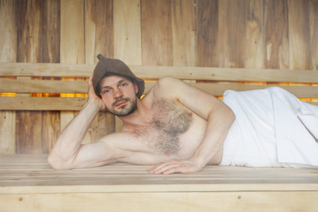 Man relaxing in the sauna