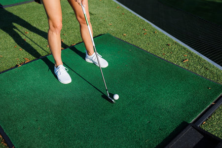 Energetic Golfer Tees Off with Precisionの写真素材