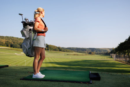 Blonde Beauty on the Golf Course Pathの写真素材