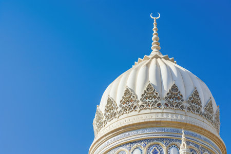 Beautiful Mosque Dome Illuminated by Bright Blue Skyの素材