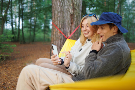 Romantic Moments in a Hammock with Smartphone