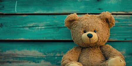 Endearing Bear Portrait Against Green Wooden Planksの素材