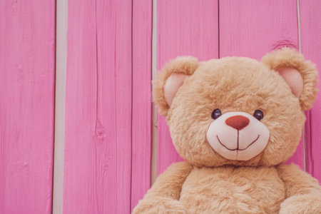 Cute Bear Portrait with Pink Wooden Backdropの素材