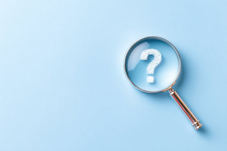 Magnifying Glass with Question Mark on Blue Backgroundの素材