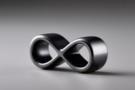Metallic Infinity Symbol on Gray Backgroundの素材