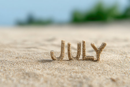 Word July Written in Sandの素材