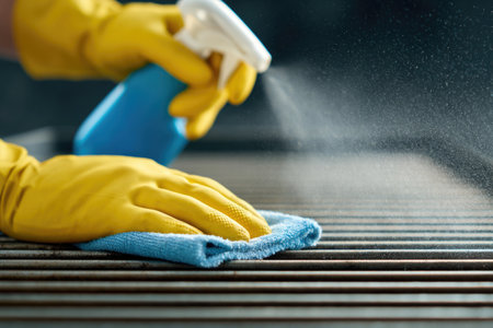 Cleaning Metal Grill with Spray and Glovesの素材