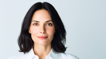 Portrait of a Confident Woman in White Shirtの素材