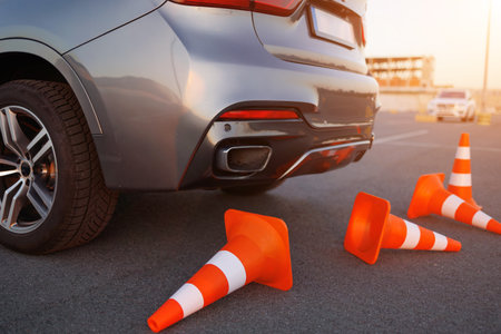 Knocked Over Traffic Cones Behind Learner Driver Vehicleの写真素材