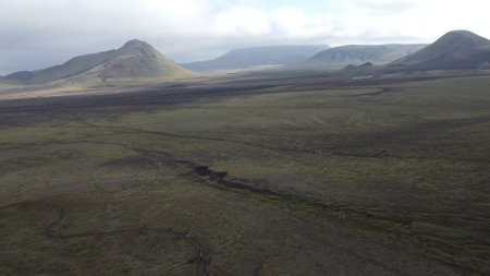 Icelandic landscape - aerial view of the hills and meadowsの写真素材
