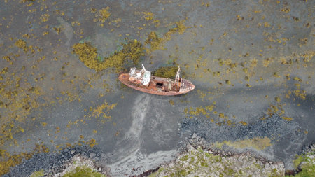 Aerial view of the old shipwreck on the seashoreの写真素材