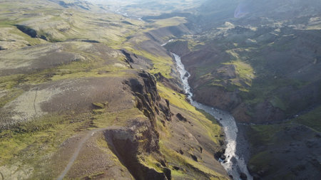 Aerial view of a river flowing through the valley in Iceland.の写真素材
