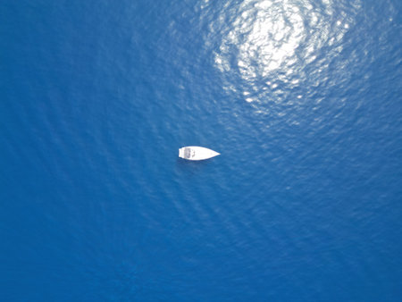 Sailing boat in the sea. View from above. Blue water.の写真素材