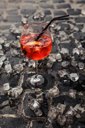 red wine and ice cubesの写真素材