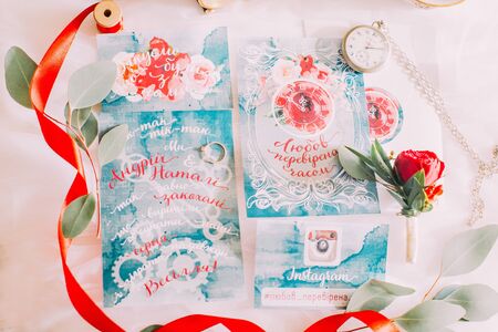 Cute wedding postcards. Invitations  to the celebration on white background close up.の写真素材