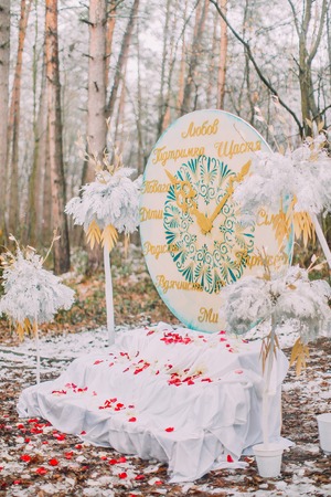 Interesting wedding decorations in the autumn forest.の写真素材