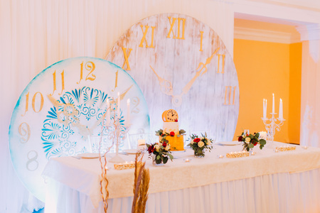 Beautiful decorated with flowers wedding table. Wedding cake. Sweets.の写真素材