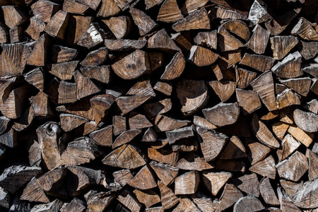 Stacks of firewood close up.