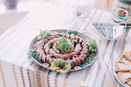 Table of different tasty snacks, served in traditional east slavic rurral style, close-up.の写真素材